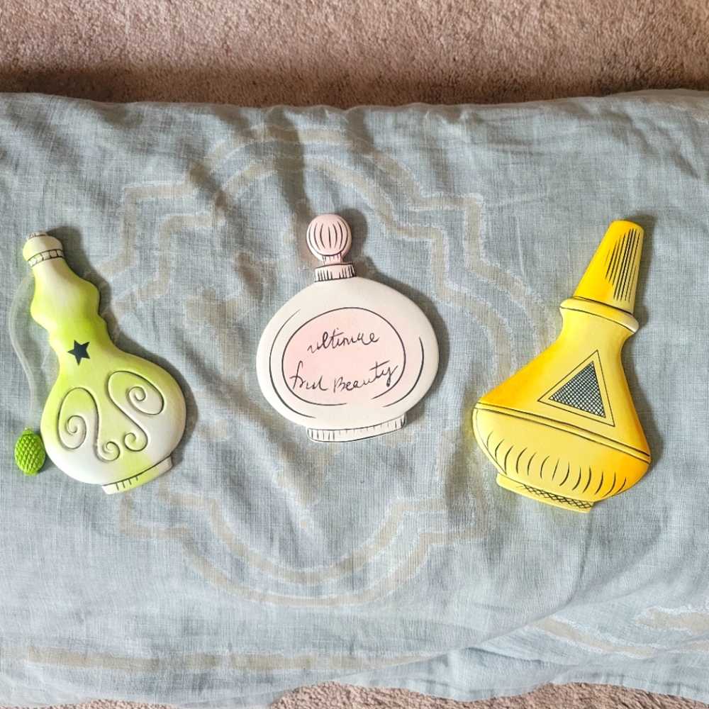 Cute perfume bottle wall decor, set of three from Home Interiors